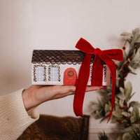 La petite boîte de bougies de Noël