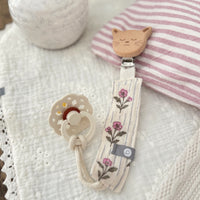 Attache-suce en mousseline