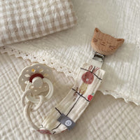 Attache-suce en mousseline