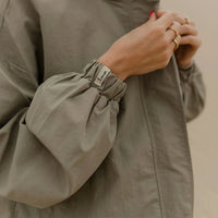 Manteau nylon ajustable