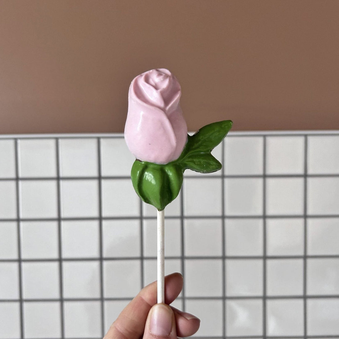Sucette rose au chocolat