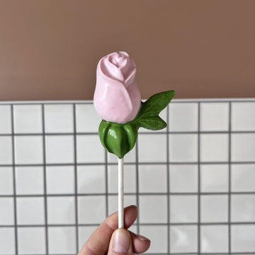 Sucette rose au chocolat